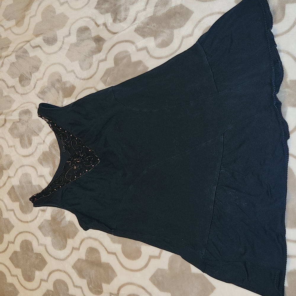 Limited sleeveless tunic